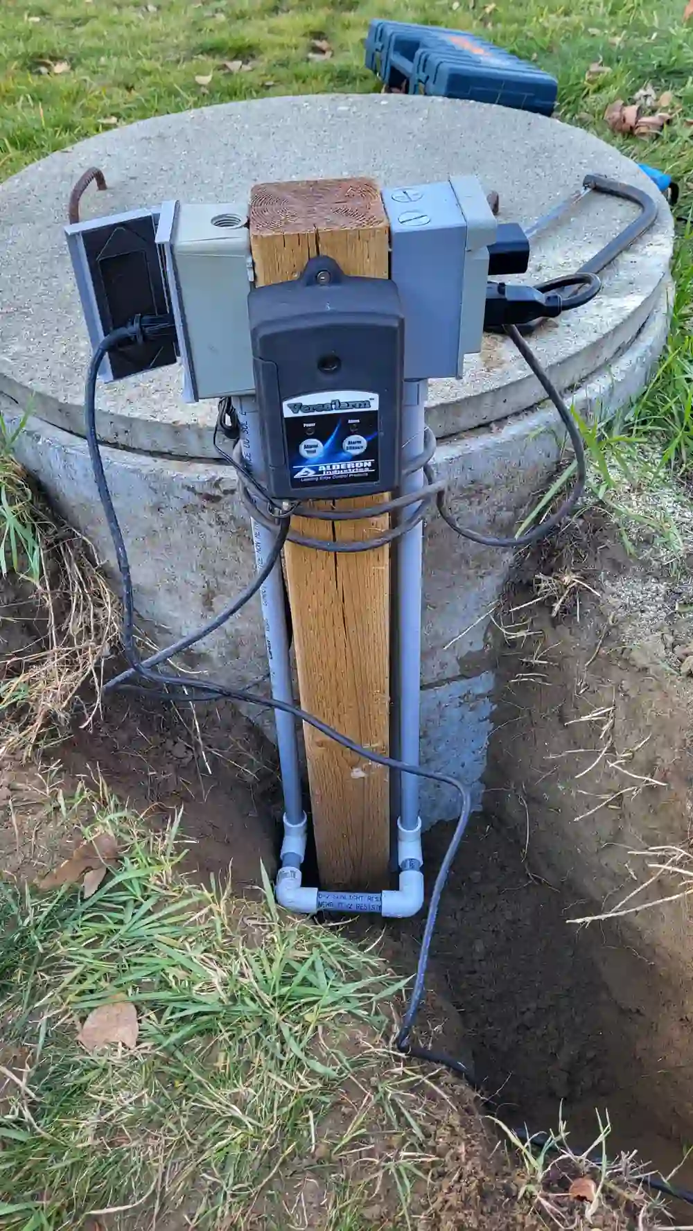 Septic system inspection equipment installed on tank riser